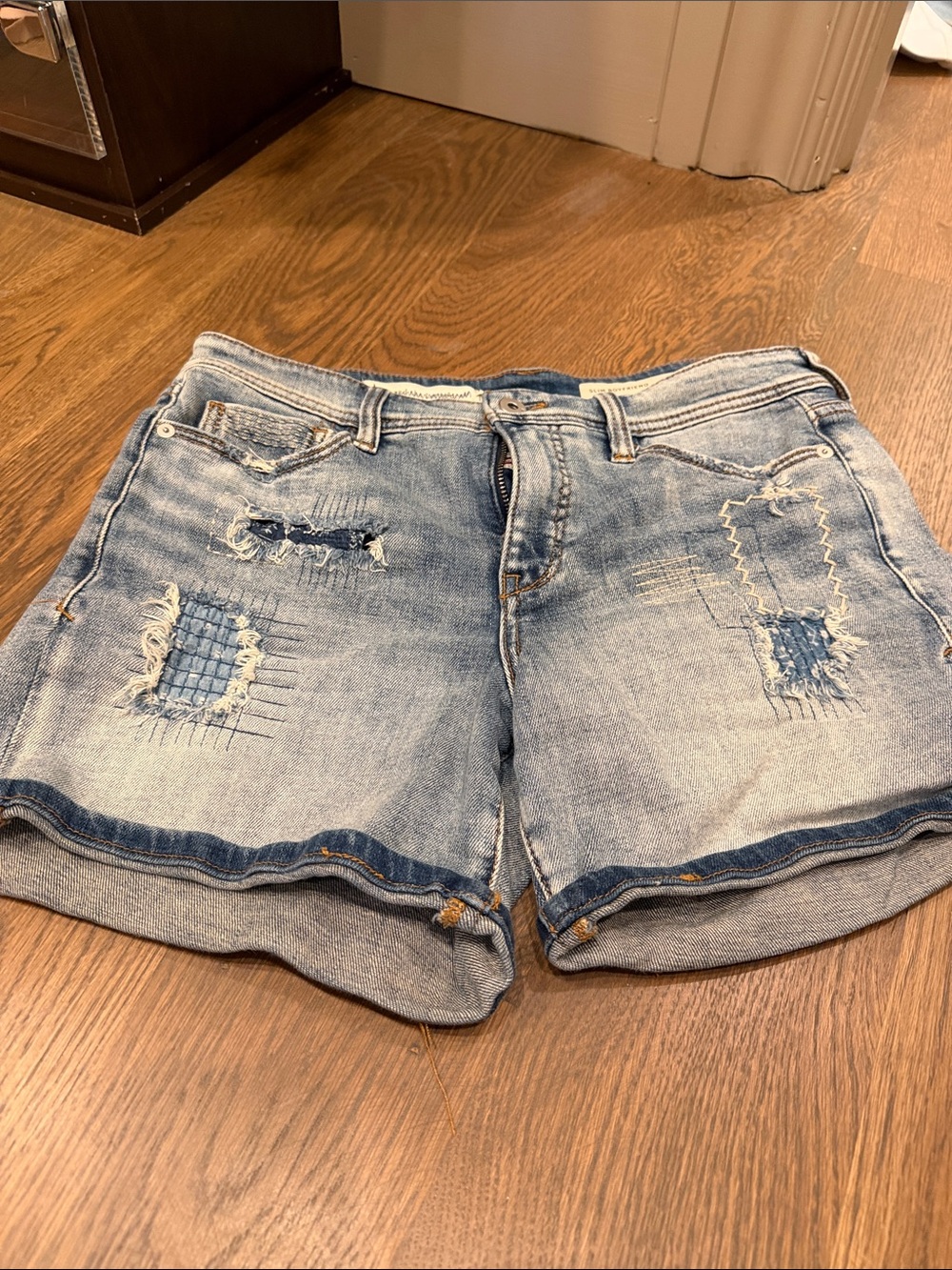 Women’s Distressed Light Blue Denim Shorts